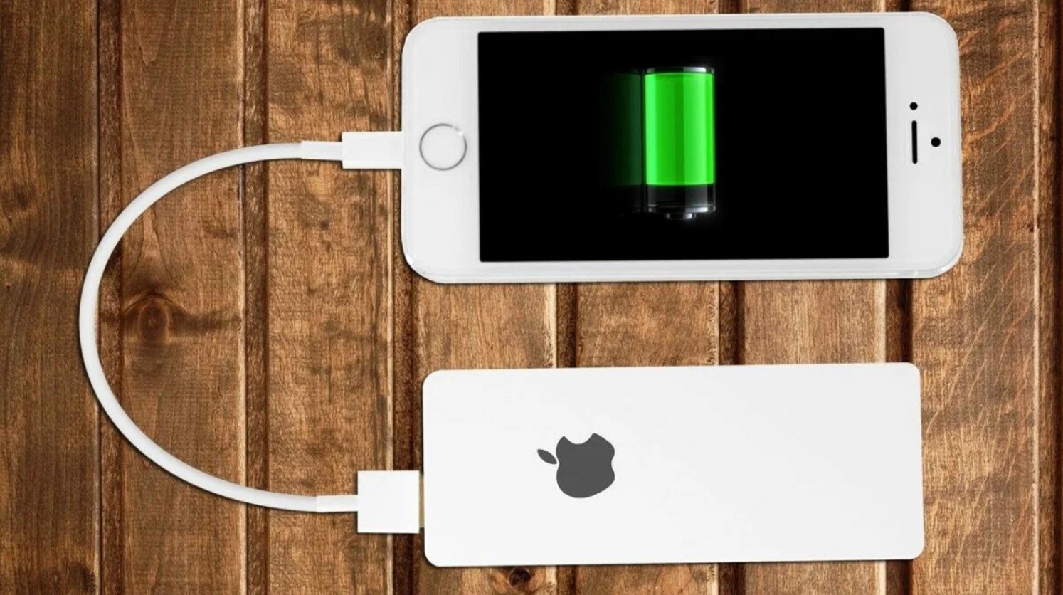 Телефон без проводов. Power Bank Apple 6000. Портативная аппл Эппл зарядка. Пауэр Бэнк зарядка для айфона. Внешний аккумулятор зарядник appel.